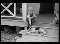 [Untitled photo, possibly related to: Wife and children of tenant farmer who has been resettled, Irwin County, Georgia]. Sourced from the Library of Congress.