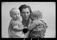 [Untitled photo, possibly related to: Mrs. Hallett and Mrs. Weber with their children, Tompkins County, New York]. Sourced from the Library of Congress.