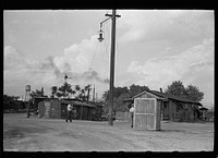 [Untitled photo, possibly related to: Slums at Cinder Point between railroad and Illinois River, Peoria, Illinois]. Sourced from the Library of Congress.