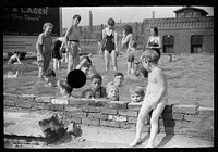 [Untitled photo, possibly related to: Homemade swimming pool for steelworkers' children, Pittsburgh, Pennsylvania]. Sourced from the Library of Congress.