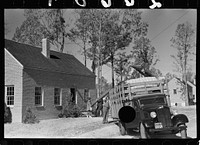 [Untitled photo, possibly related to: Moving into Newport News Homesteads, Virginia]. Sourced from the Library of Congress.