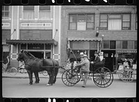 Entering a buggy, Billings, Montana. Sourced from the Library of Congress.