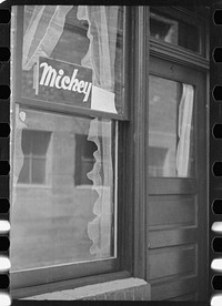 [Untitled photo, possibly related to: Sign in window, Venus Alley, Butte, Montana]. Sourced from the Library of Congress.