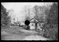 [Untitled photo, possibly related to: Lack of proper housing forces mill workers into shacks along river, Millville, New Jersey]. Sourced from the Library of Congress.