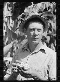 [Untitled photo, possibly related to: Farmer with hybrid corn, Hardin County, Iowa]. Sourced from the Library of Congress.