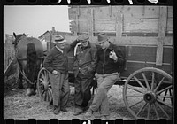 Farmers at cornhusking contest, Marshall County, Iowa. Sourced from the Library of Congress.