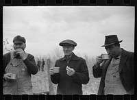 [Untitled photo, possibly related to: Farmers at cornhusking contest, Marshall County, Iowa]. Sourced from the Library of Congress.