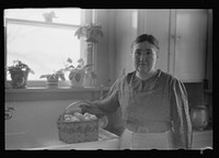 [Untitled photo, possibly related to: Mrs. Haubeil in her kitchen of her home, Ross County, Ohio]. Sourced from the Library of Congress.