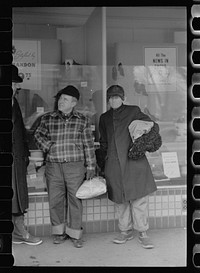 [Untitled photo, possibly related to: Farmers shopping, Marshalltown, Iowa]. Sourced from the Library of Congress.