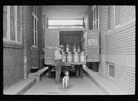 [Untitled photo, possibly related to: Milk receiving station, Farmington, Minnesota]. Sourced from the Library of Congress.