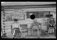 [Untitled photo, possibly related to: Noon-day siesta in front of a lunchroom at Helmsburg, Indiana]. Sourced from the Library of Congress.