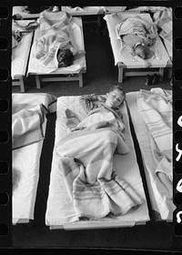 [Untitled photo, possibly related to: Midday nap, nursery school, FSA (Farm Security Administration) camp, Harlingen, Texas]. Sourced from the Library of Congress.