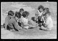 [Untitled photo, possibly related to: Migratory worker's child at community store, FSA (Farm Security Administration) camp, Sinton, Texas]. Sourced from the Library of Congress.