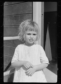 Migratory worker's child, nursery school, FSA (Farm Security Administration) camp, Weslaco, Texas. Sourced from the Library of Congress.