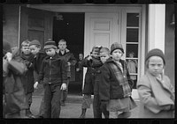 [Untitled photo, possibly related to: Children leaving grade school at Reedsville, West Virginia]. Sourced from the Library of Congress.