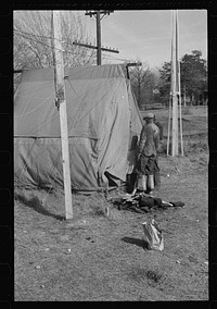 [Untitled photo, possibly related to:  flood refugee washing clothes in the camp at Forrest City, Arkansas]. Sourced from the Library of Congress.
