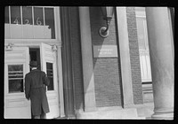 [Untitled photo, possibly related to: Staff doctor entering Provident Hospital, Chicago, Illinois]. Sourced from the Library of Congress.