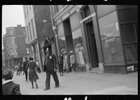 [Untitled photo, possibly related to: Street scene, Black Belt, Chicago, Illinois]. Sourced from the Library of Congress.