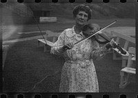 [Untitled photo, possibly related to: Aunt Samantha Baumgarner [i.e. Bumgarner], fiddler, banjoist, guitarist, North Carolina, Asheville]. Sourced from the Library of Congress.