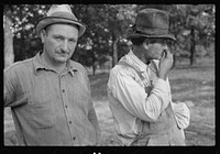 [Untitled photo, possibly related to: Man watching square dance, Skyline Farms, Alabama]. Sourced from the Library of Congress.