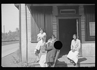 [Untitled photo, possibly related to: The Shack, a one time church; milk is dispensed here. Relief clients wait for hours, Scotts Run, West Virginia]. Sourced from the Library of Congress.