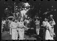 [Untitled photo, possibly related to: Spectators at sideshow, county fair, central Ohio]. Sourced from the Library of Congress.