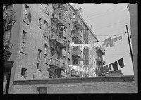 New York, New York. 61st Street between 1st and 3rd Avenues. Apartment houses from the rear. Sourced from the Library of Congress.