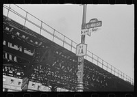 [Untitled photo, possibly related to: New York, New York. 61st Street between 1st and 3rd Avenues. Street signs]. Sourced from the Library of Congress.