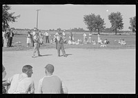 [Untitled photo, possibly related to: Watching a baseball game, central Ohio]. Sourced from the Library of Congress.