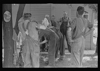 [Untitled photo, possibly related to: Waiting around before dinner during wheat harvest, central Ohio]. Sourced from the Library of Congress.