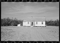 [Untitled photo, possibly related to: Carpenter at work, Eatonton, Georgia. Briar Patch Project]. Sourced from the Library of Congress.