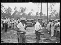 [Untitled photo, possibly related to:  workmen having lunch, Newport News Homesteads, Virginia]. Sourced from the Library of Congress.
