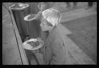 [Untitled photo, possibly related to: es in the lineup for food at mealtime in the camp for flood refugees, Forrest City, Arkansas]. Sourced from the Library of Congress.