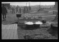 [Untitled photo, possibly related to: The kitchen in the camp for white flood refugees at Forrest City, Arkansas]. Sourced from the Library of Congress.
