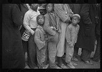 Flood refugees at mealtime, Forrest City, Arkansas. Sourced from the Library of Congress.