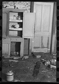 Interior of a farmhouse near Ridgeley, Tennessee, after the 1937 flood waters had subsided. Sourced from the Library of Congress.