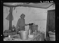 Mexican rehabilitation client inside jacal. Dona Ana County, New Mexico. Sourced from the Library of Congress.