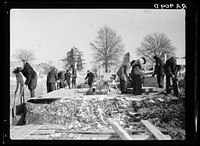 Work progresses on the first unit of houses despite the bad weather. Berwyn project, Maryland. Sourced from the Library of Congress.