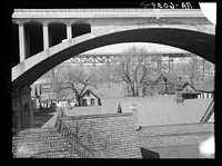 Housing under Wisconsin Avenue viaduct. Milwaukee, Wisconsin. Sourced from the Library of Congress.