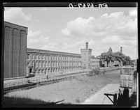 Amoskeag mills looking north from Bridge Street on Canal Street side. Manchester, New Hampshire. Sourced from the Library of Congress.