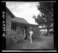 Doctor Tugwell visiting rehabilitation client's home. South Dakota. Sourced from the Library of Congress.