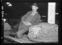 Rehabilitation client with his tobacco crop. Oxford, North Carolina. Sourced from the Library of Congress.