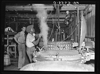 Scene in vegetable canning plant. Dania, Florida. About half of these workers are from other states. Sourced from the Library of Congress.