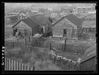 Houses along the railroad tracks. Omaha, Nebraska. Sourced from the Library of Congress.