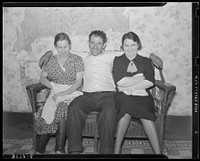 Coal miner with wife and neighbor. Kempton, West Virginia. Sourced from the Library of Congress.