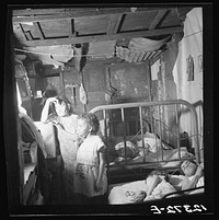 Interior of workers shack. Porta de Tierra, San Juan, Puerto Rico. Sourced from the Library of Congress.