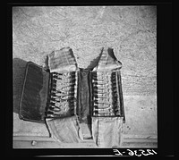 A gentleman's wallet containing metal spurs for fighting cocks. Puerto Rico. Sourced from the Library of Congress.