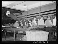 Washington, D.C. Sorting mail at the main post office. Sourced from the Library of Congress.