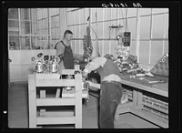 Workers in the vacuum cleaner factory at Reedsville, West Virginia. Sourced from the Library of Congress.