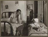Washington, D.C. Mrs. Ella Watson, who has been a government charwoman for twenty-six years, with three of the five children she supports on her salary of one thousand eighty dollars per year. Sourced from the Library of Congress.